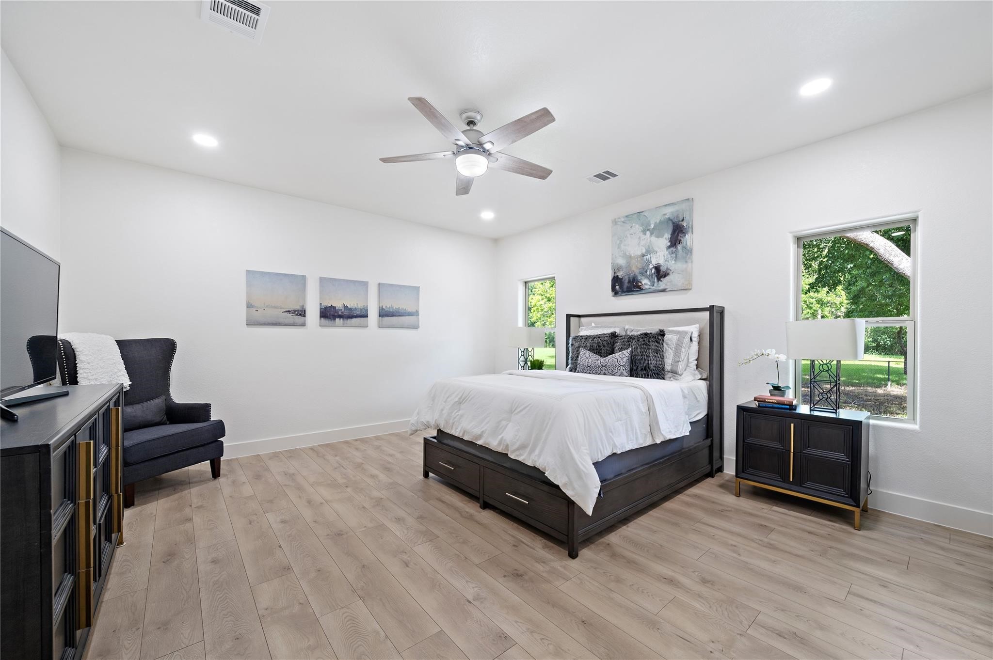 459 Live Oak Road Wharton, TX 77488 - Photo 10 of 27 a spacious bedroom with a bed and a couch