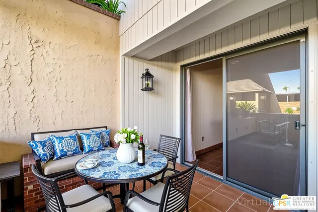 a view of a swimming pool with a yard