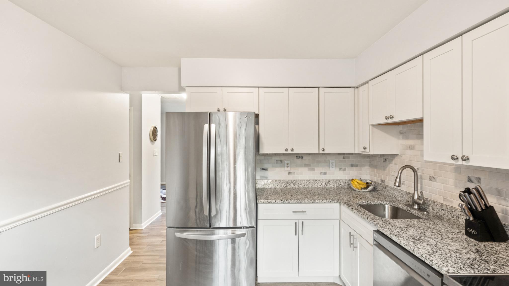 2017 Headlands Circle Reston, VA 20191 - Photo 16 of 28 Modern kitchen with stainless steel appliances