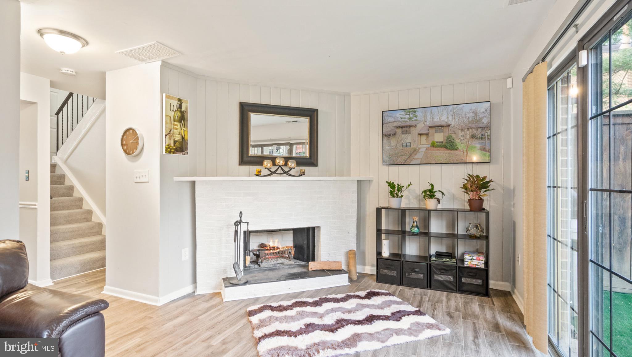 2017 Headlands Circle Reston, VA 20191 - Photo 21 of 28 Cozy living space with inviting fireplace.