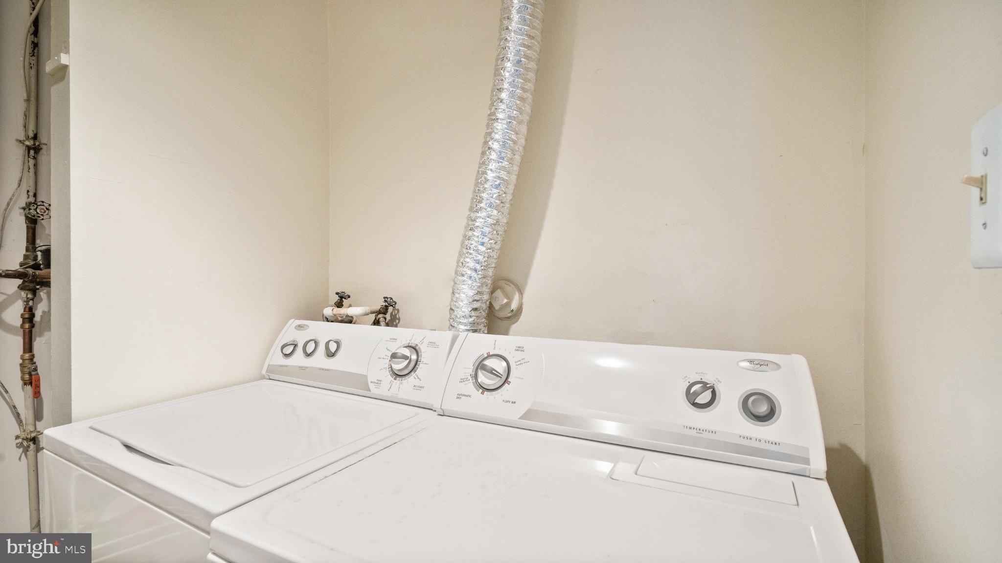 2017 Headlands Circle Reston, VA 20191 - Photo 24 of 28 Full laundry room with storage