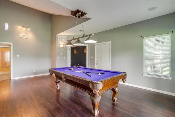 a view of a kitchen with furniture and a kitchen