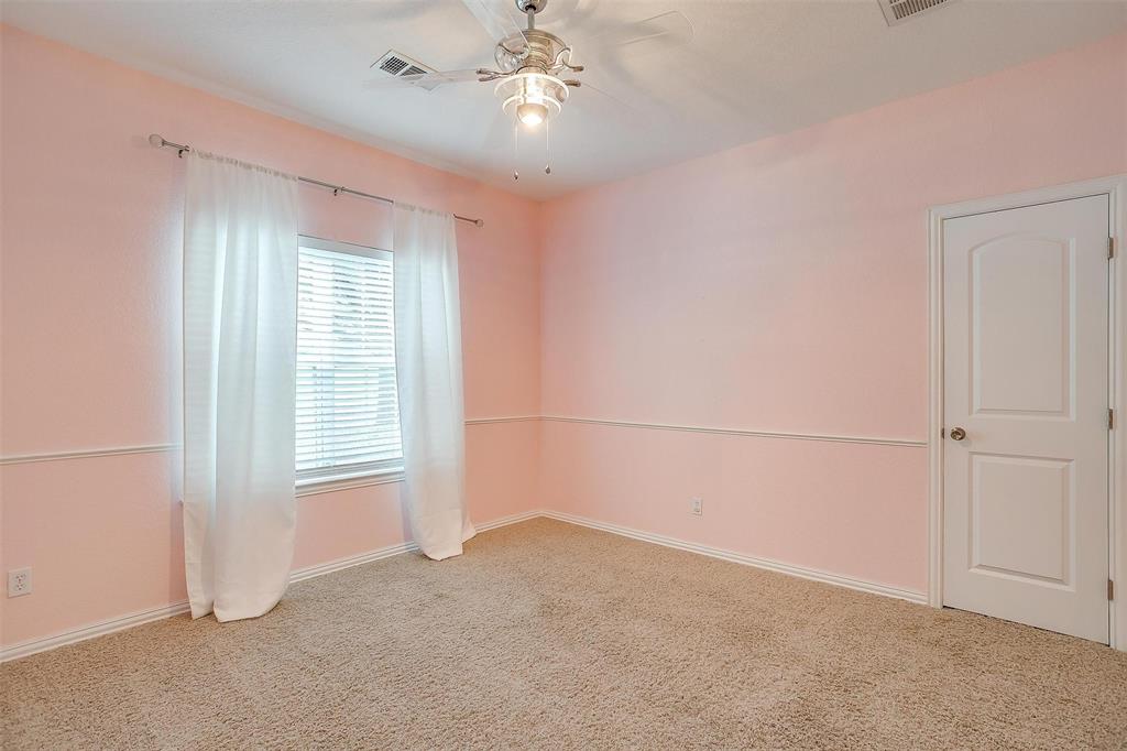 11972 Younger Court Azle, TX 76020 - Photo 28 of 40 an empty room with chandelier fan