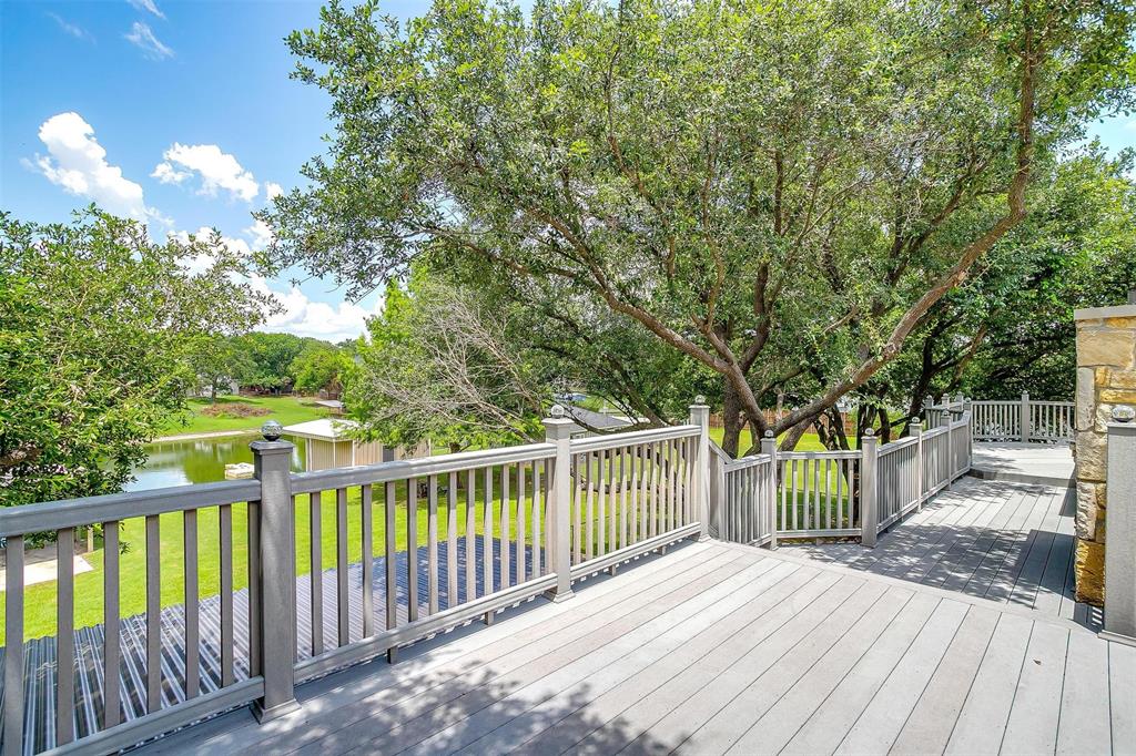 11972 Younger Court Azle, TX 76020 - Photo 36 of 40 a view of a deck with wooden floor and fence