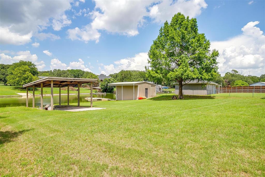 11972 Younger Court Azle, TX 76020 - Photo 37 of 40 a view of a house with a yard