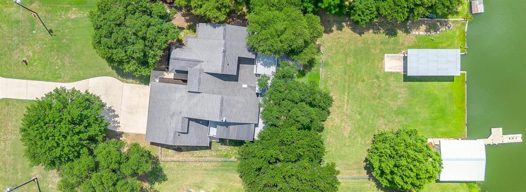11972 Younger Court Azle, TX 76020 - Photo 39 of 40 an aerial view of residential house with outdoor space and trees all around