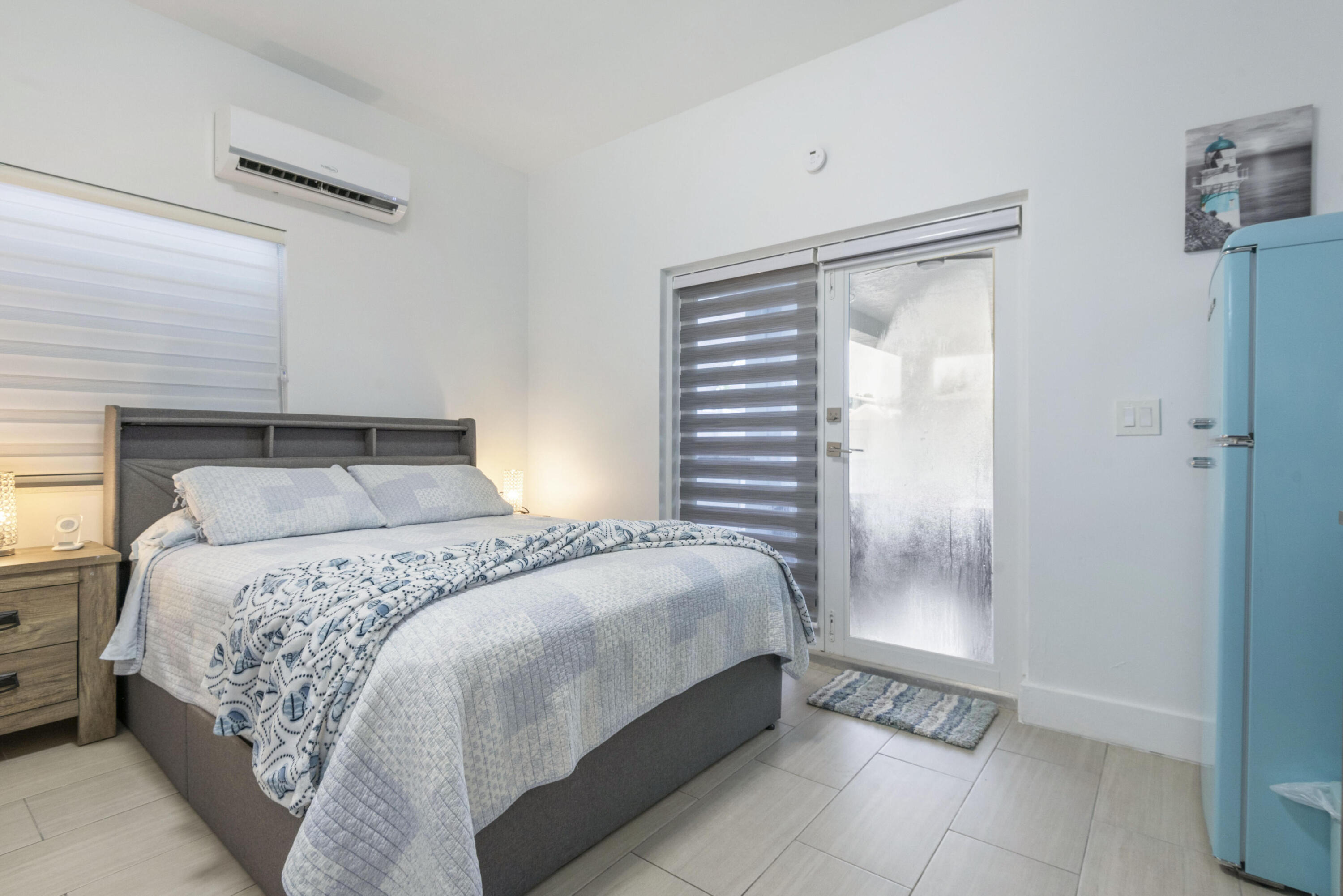 325 Calusa Street, Unit 96 Key Largo, FL 33037 - Photo 14 of 17 a bedroom with a bed and a window
