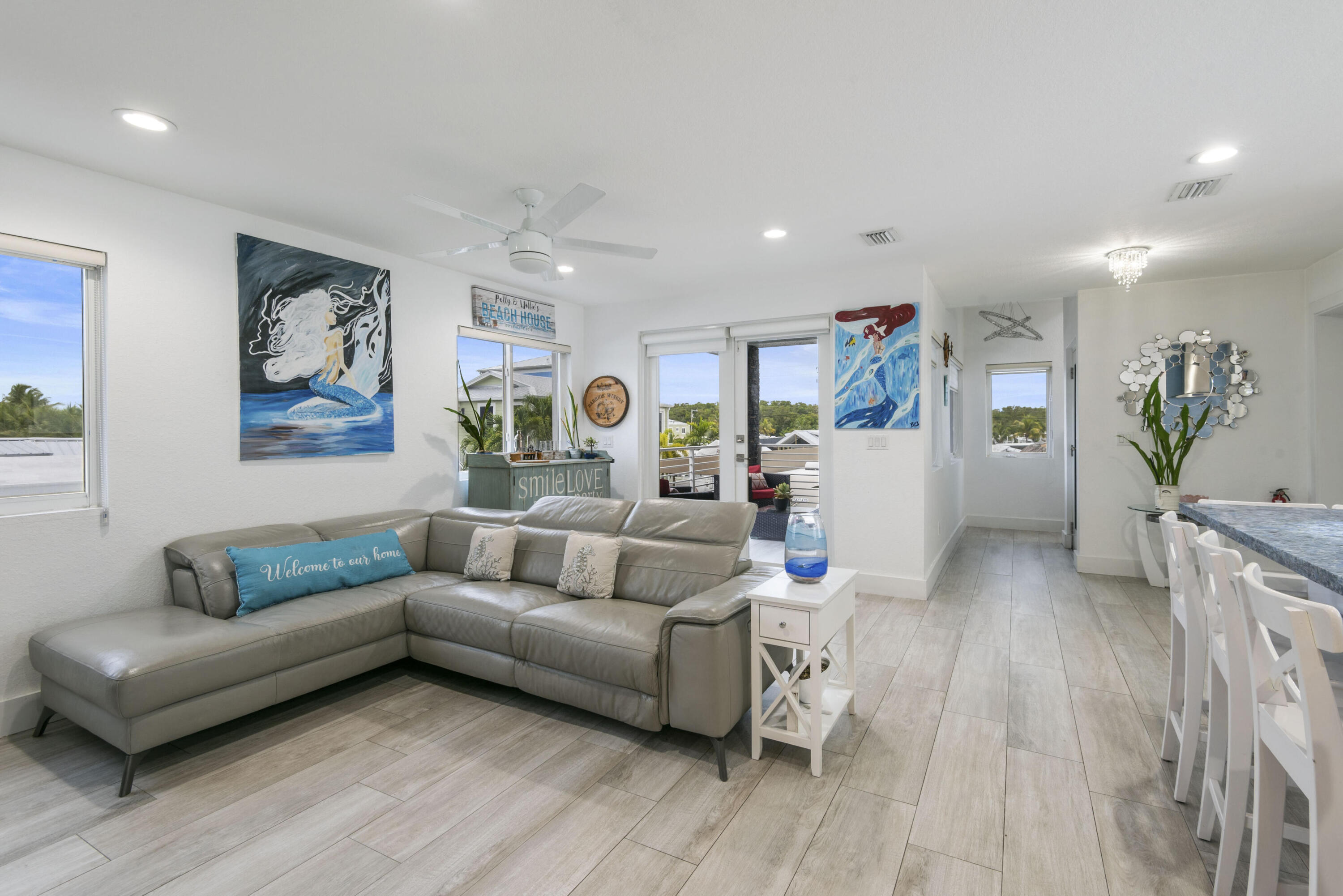 325 Calusa Street, Unit 96 Key Largo, FL 33037 - Photo 10 of 17 a living room with furniture and wooden floor