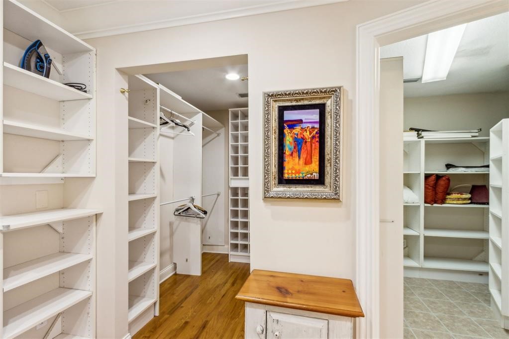 3119 Sea Marsh Road Fernandina Beach, FL 32034 - Photo 29 of 41 a view of walk in closet with clothes and shoes