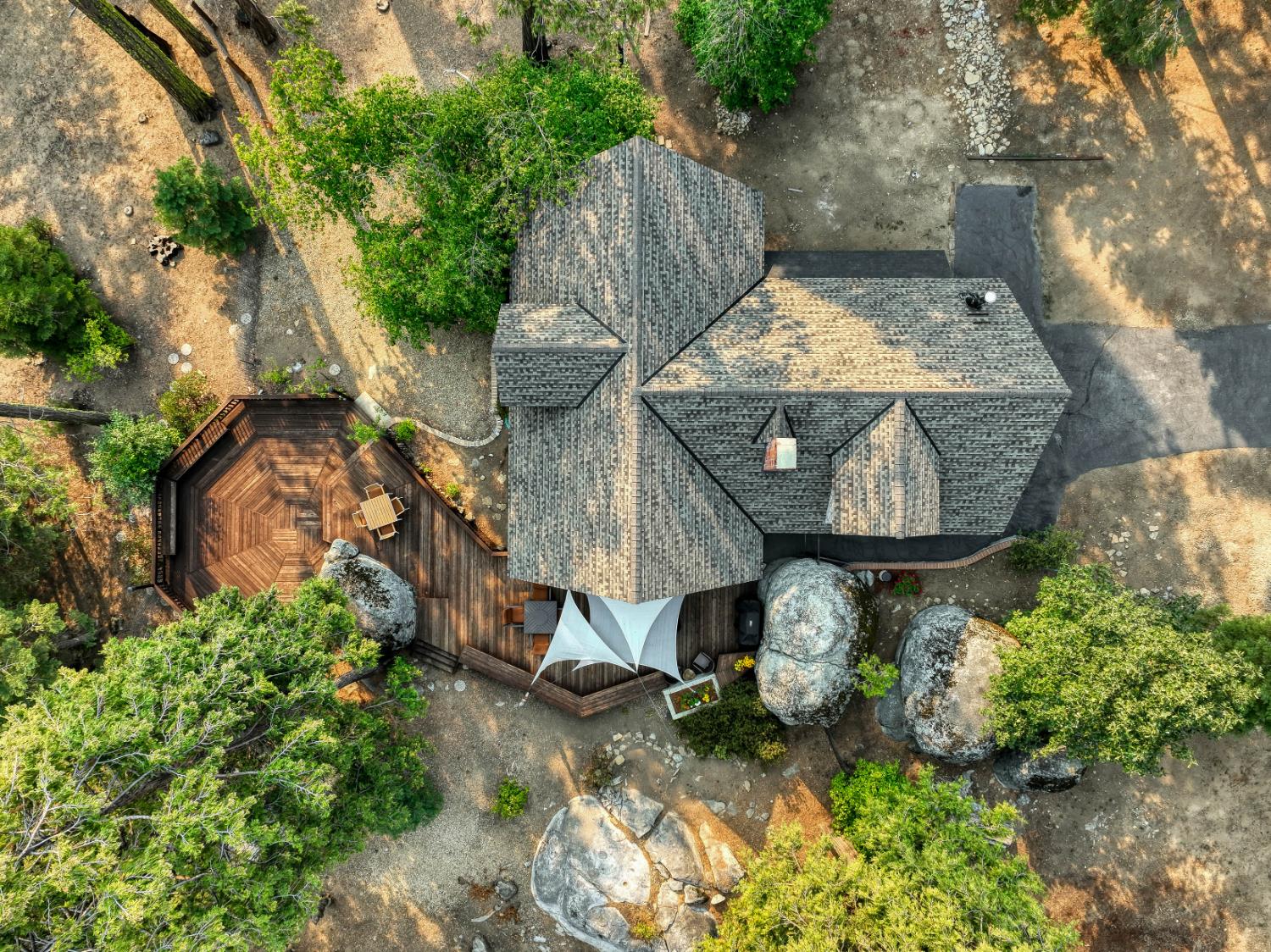 38848 Ridge Road Shaver Lake, CA 93664 - Photo 3 of 81 an aerial view of a house with a yard and outdoor seating