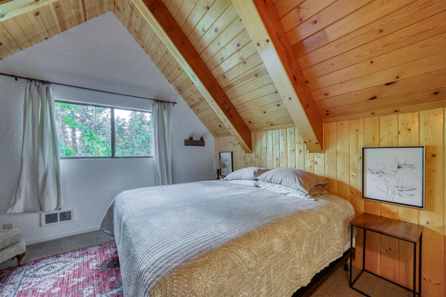 38848 Ridge Road Shaver Lake, CA 93664 - Photo 42 of 81 a bedroom with a bed next to a window