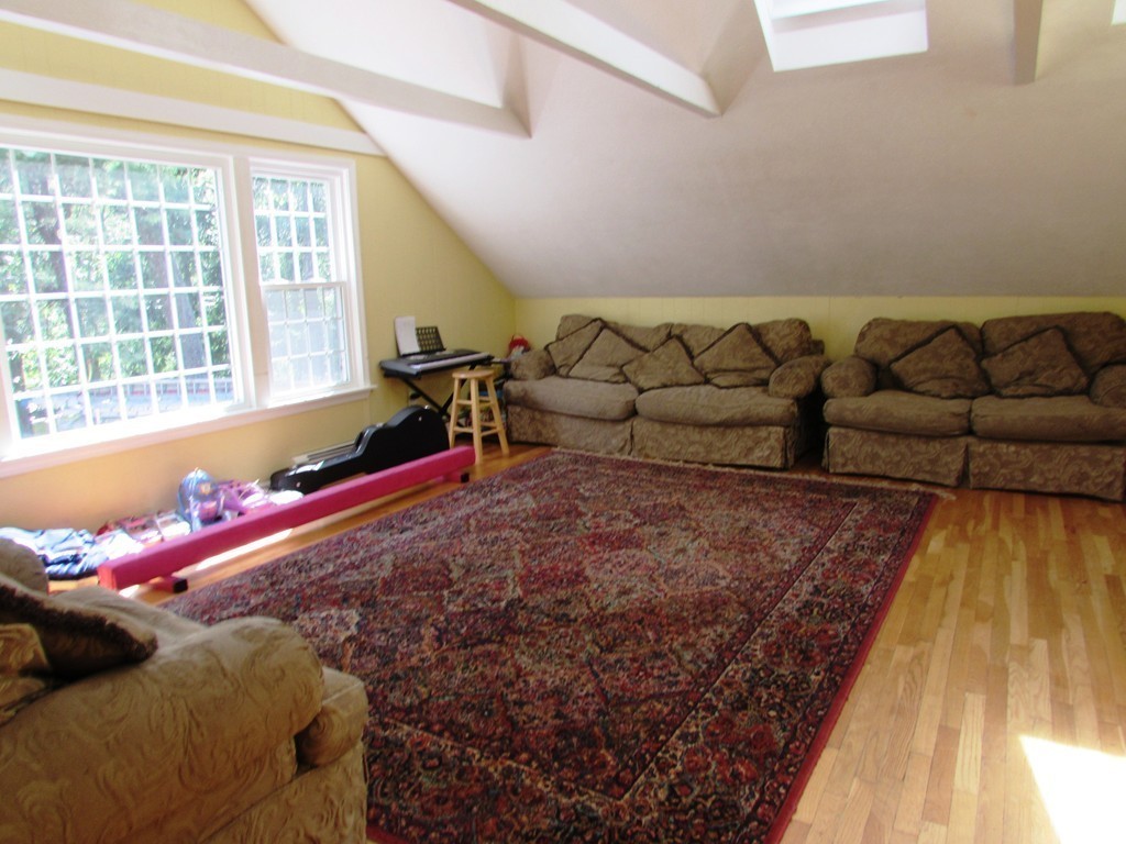 68 Herrick Road Boxford, MA 01921 - Photo 8 of 25 a living room with furniture and a couch