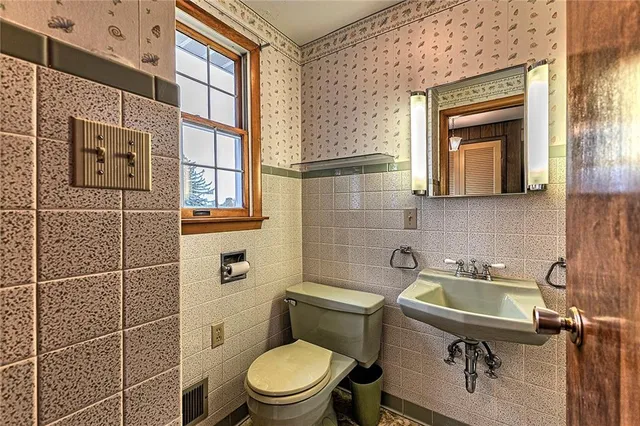 a bathroom with a tub and shower