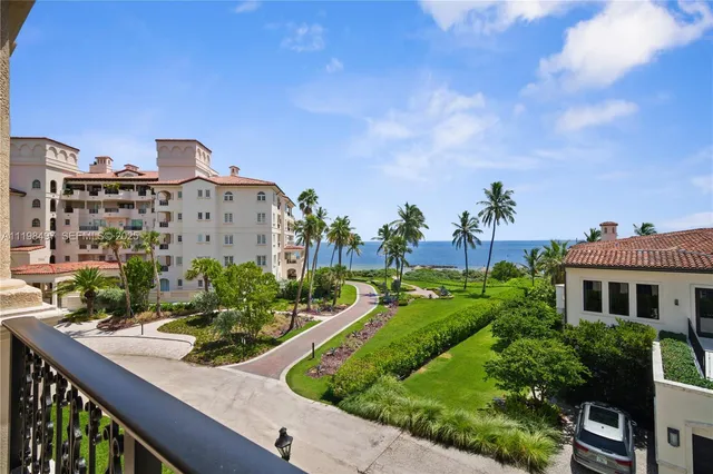 a view of a balcony with plants