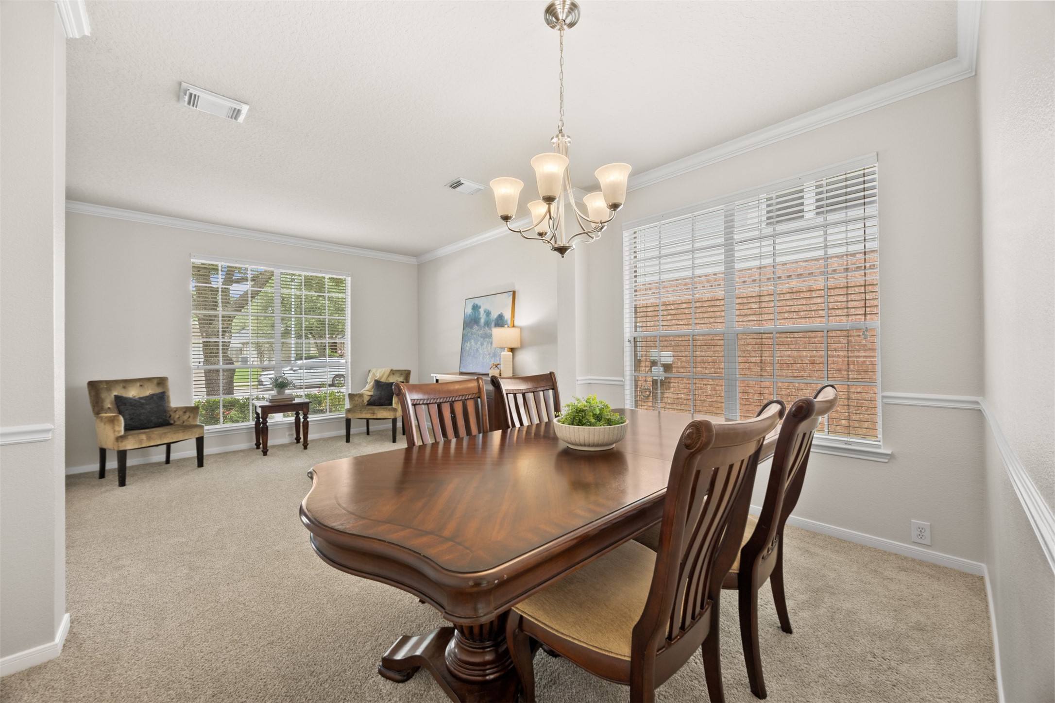 2219 Louetta Brook Lane Spring, TX 77388 - Photo 11 of 34 Bright dining space with large windows, perfect for everyday meals or entertaining