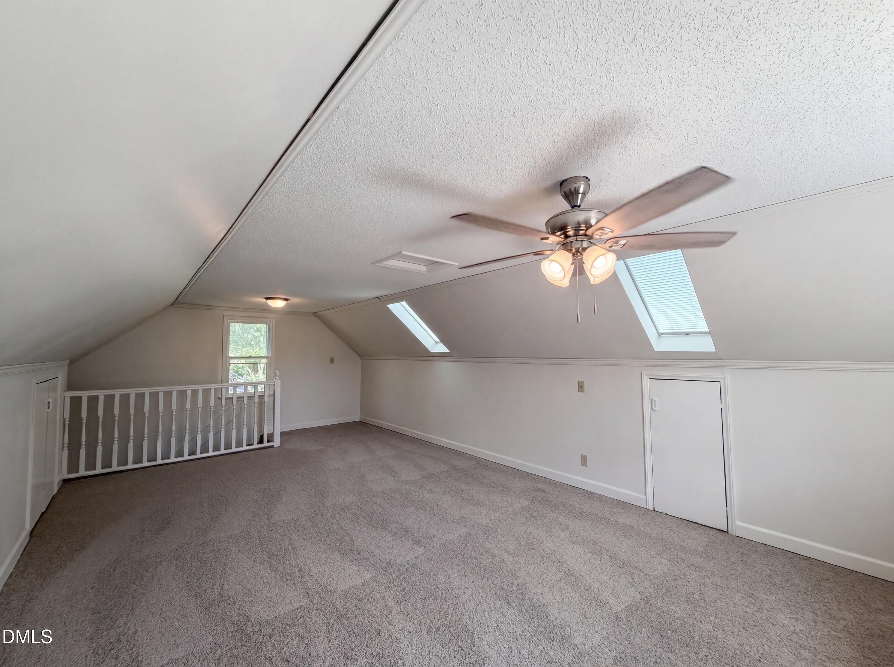 3921 Iron Horse Road Raleigh, NC 27616 - Photo 14 of 20 en empty room with ceiling fan and window
