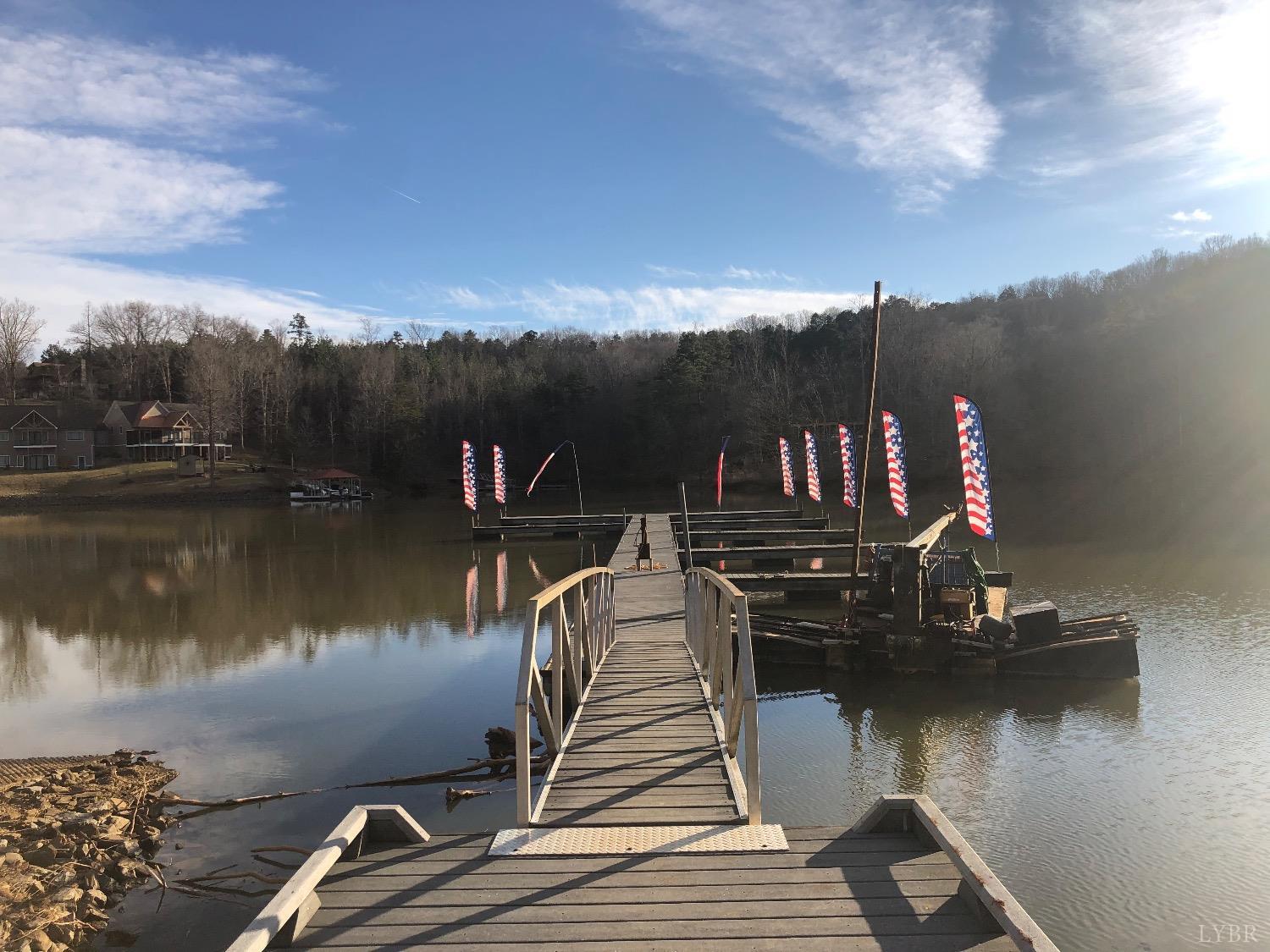 247 Clear Pointe Run Lynch Station, VA 24571 - Photo 4 of 7 a view of a lake with a large bridge