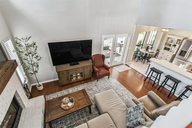 a view of a house with a yard and sitting area