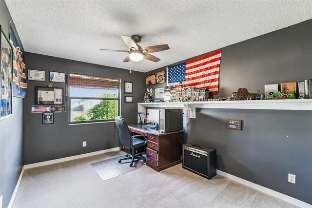 an aerial view of residential house with swimming pool