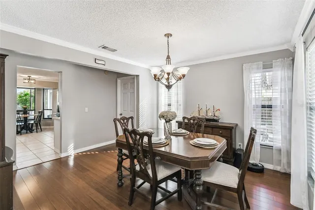 a kitchen with a refrigerator and a sink