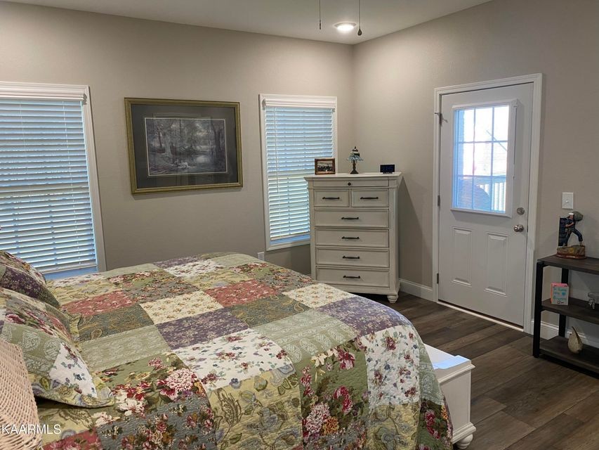 106 Maca Ridge Circle Clarkrange, TN 38553 - Photo 17 of 39 a bedroom with a bed and a window