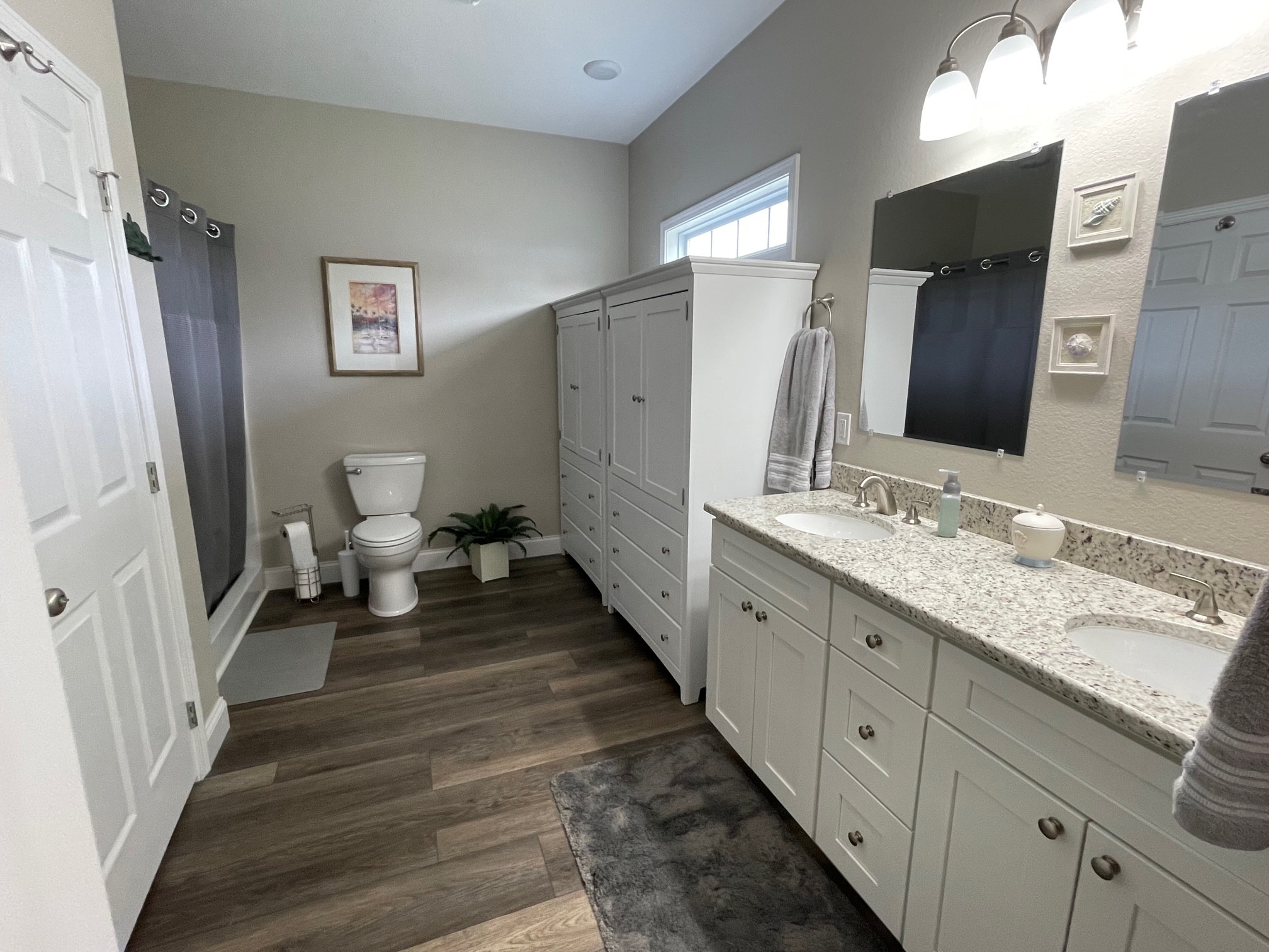 106 Maca Ridge Circle Clarkrange, TN 38553 - Photo 22 of 39 a bathroom with a double vanity sink and a mirror