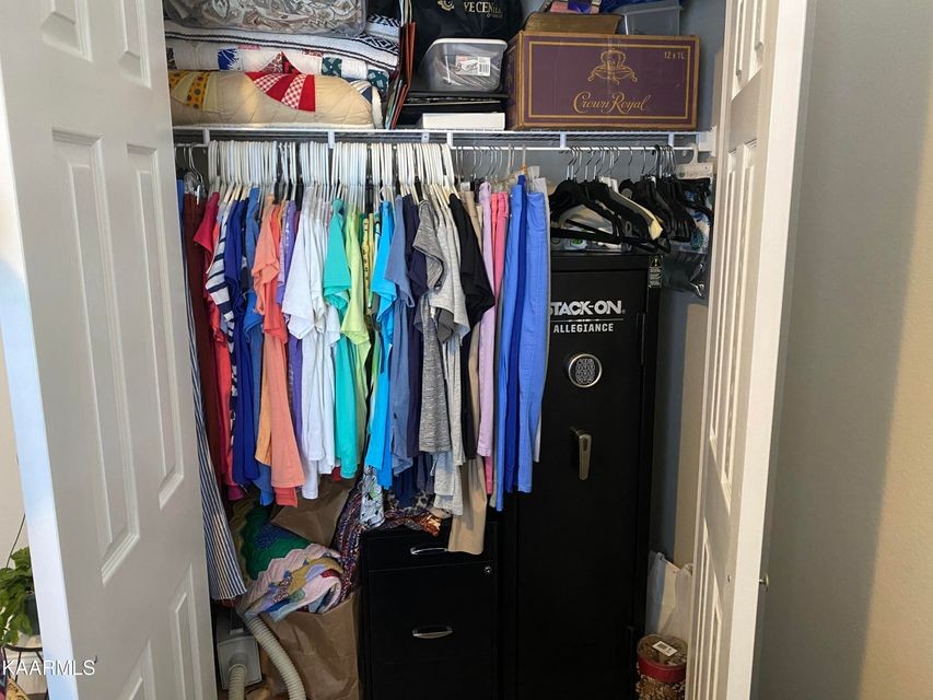 106 Maca Ridge Circle Clarkrange, TN 38553 - Photo 31 of 39 a view of walk in closet with clothes