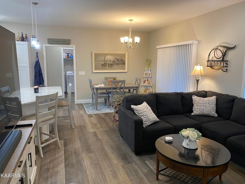 106 Maca Ridge Circle Clarkrange, TN 38553 - Photo 10 of 39 a living room with furniture and a dining table