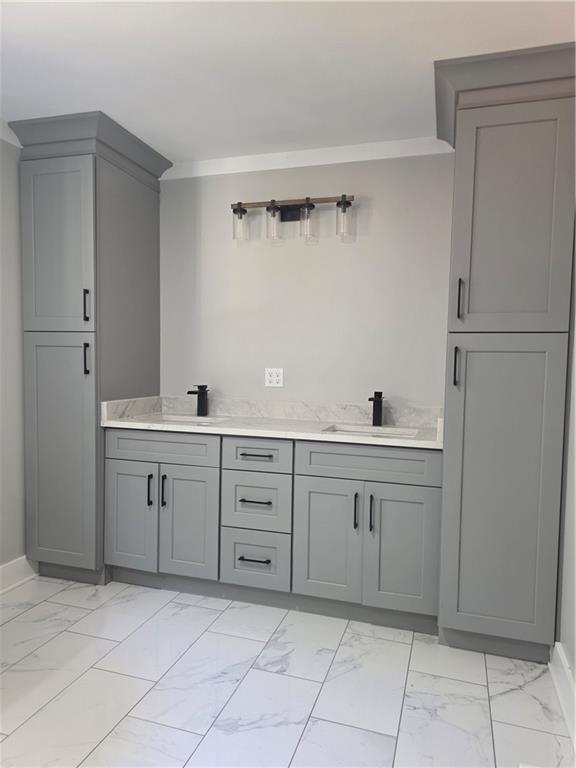 1217 Youngs Farm Road Cedartown, GA 30125 - Photo 22 of 29 a spacious bathroom with a sink and a mirror