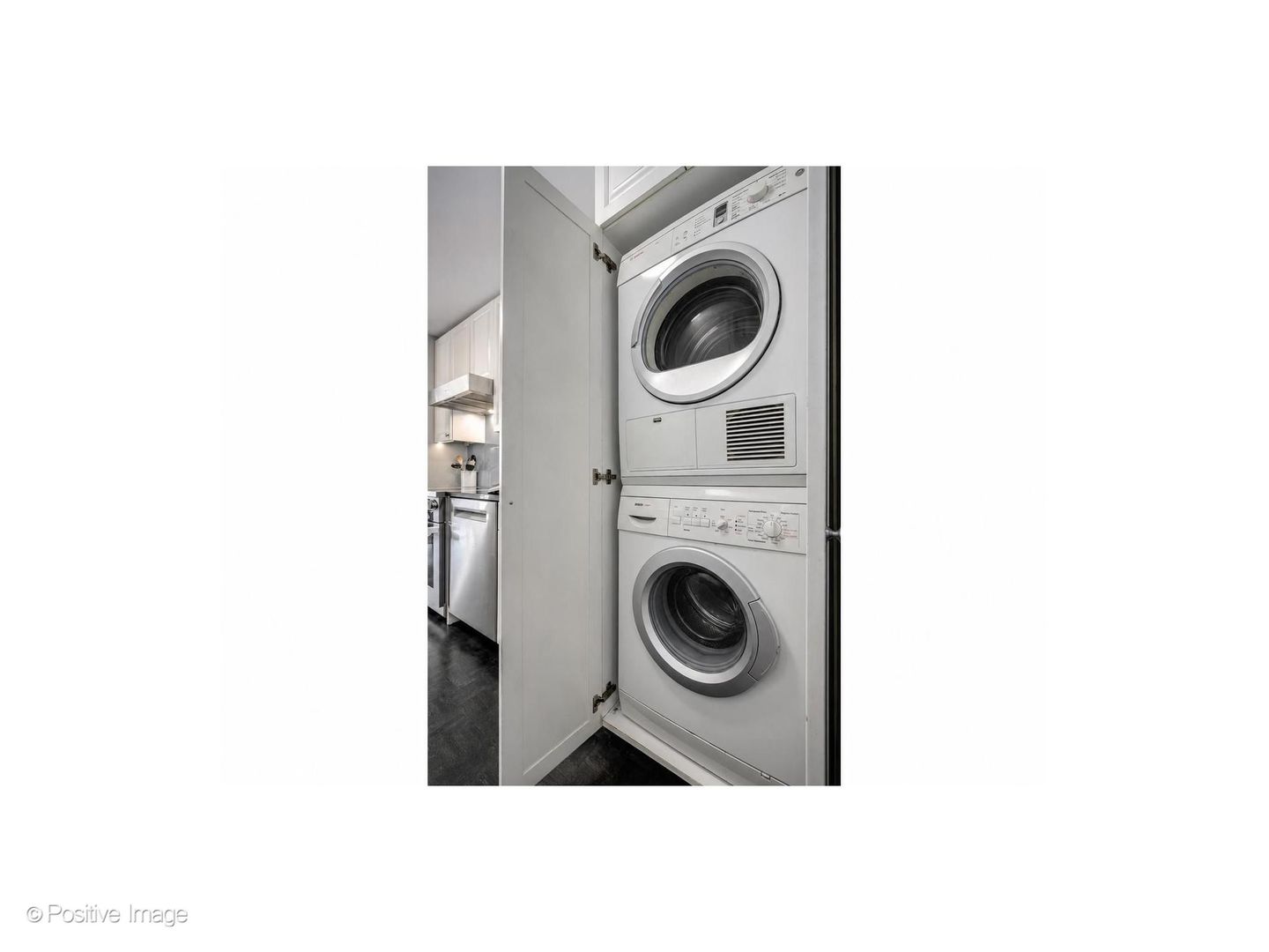 1310 North Ritchie Court, Unit 26C Chicago, IL 60610 - Photo 24 of 34 a close up view of a washer and dryer