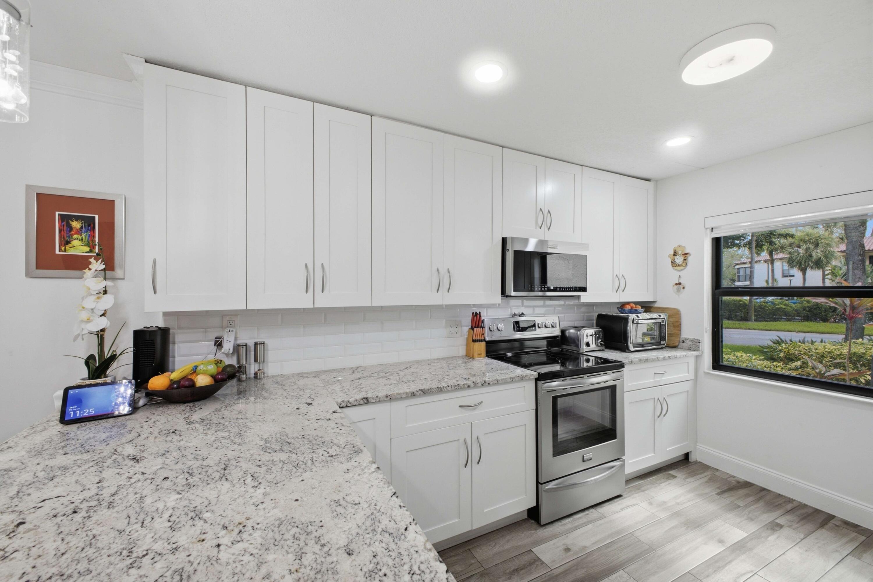 21621 Arriba Real, Unit 1I Boca Raton, FL 33433 - Photo 9 of 44 Kitchen