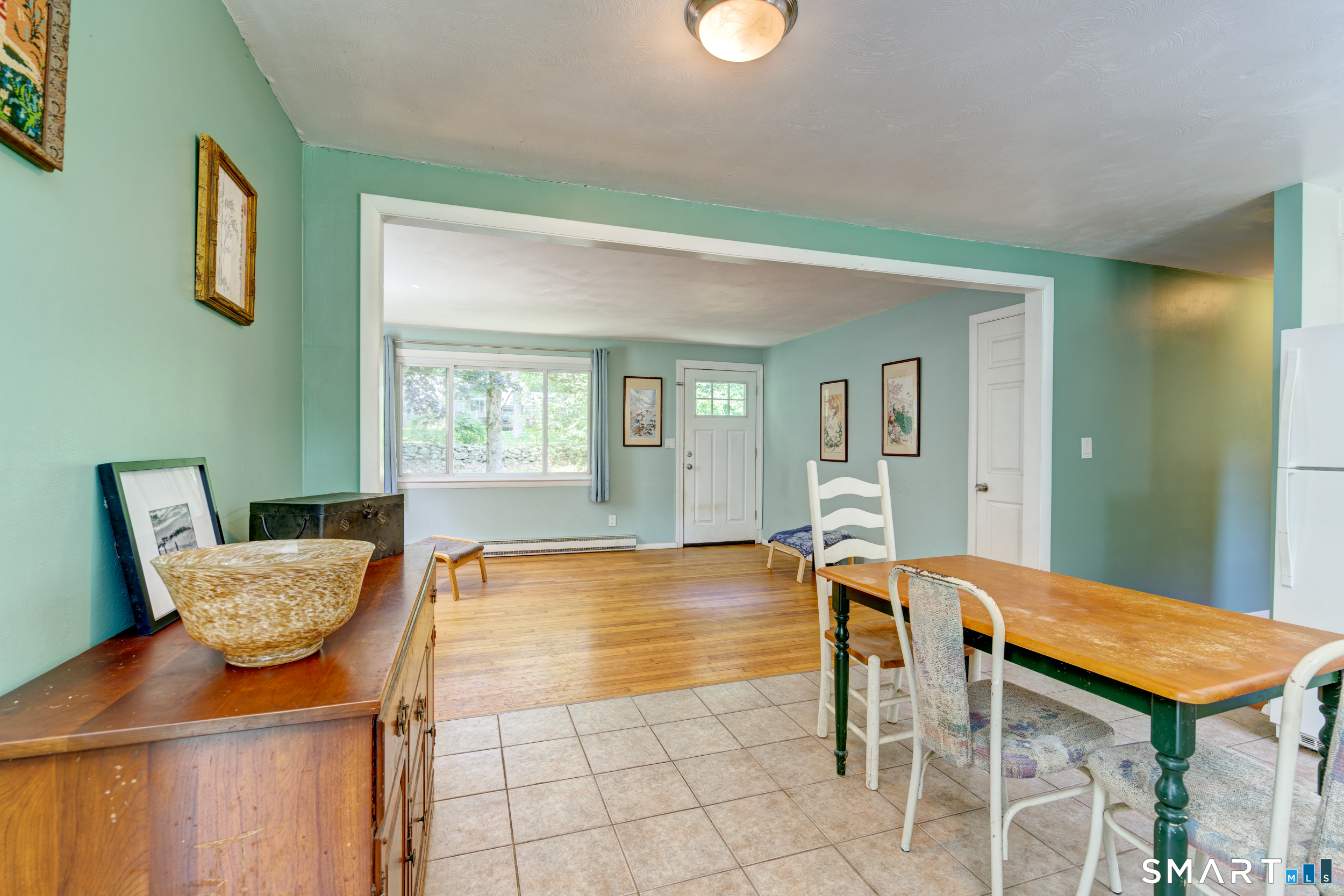 6 Chesbro Bridge Road Lebanon, CT 06249 - Photo 8 of 27 View from kitchen to living room.