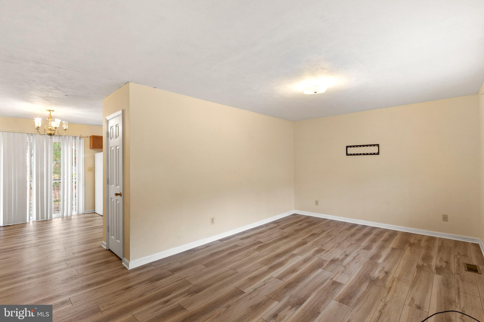 45246 Coledorall Court California, MD 20619 - Photo 6 of 21 a view of a hallway with wooden floor