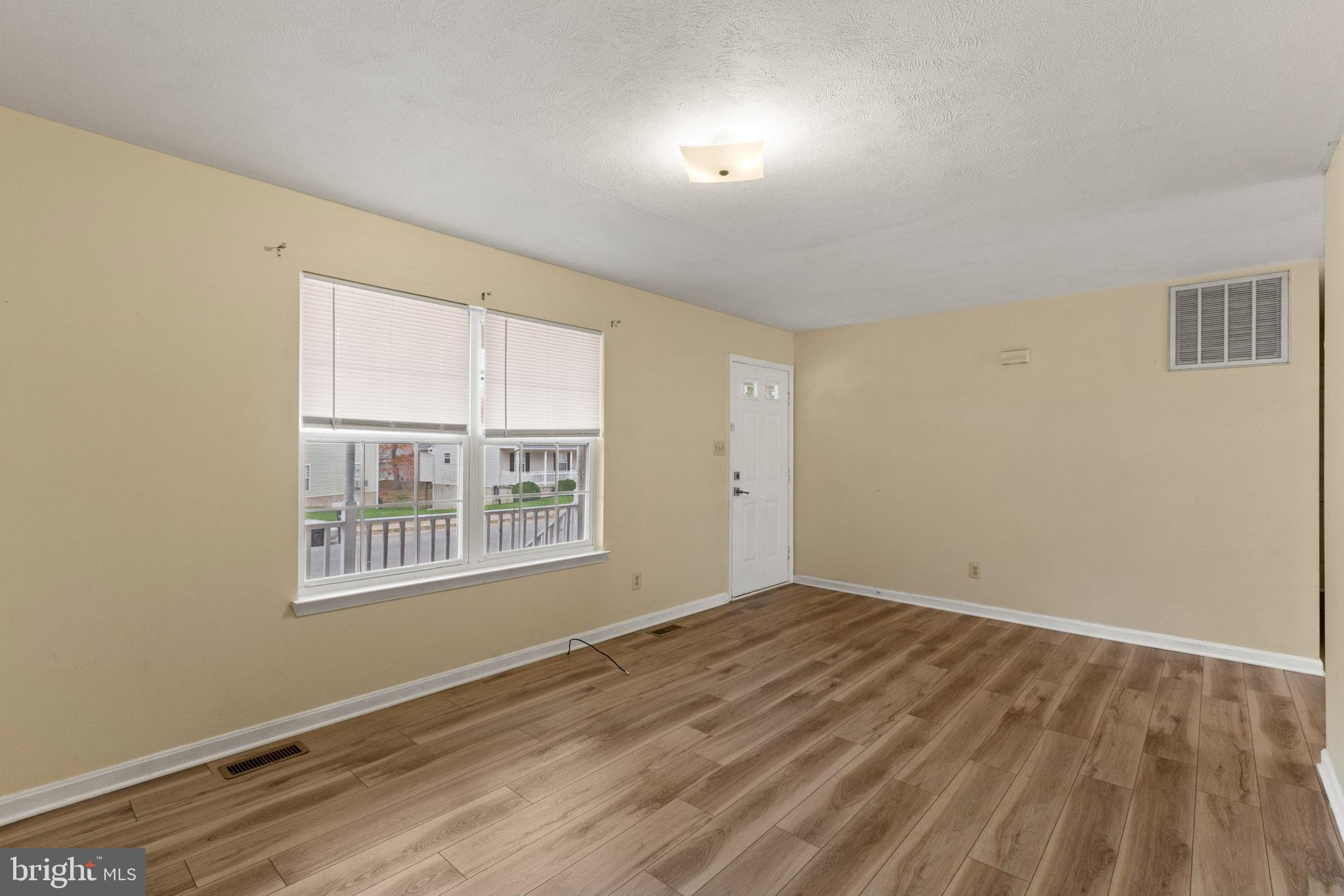 45246 Coledorall Court California, MD 20619 - Photo 8 of 21 a view of an empty room with a window
