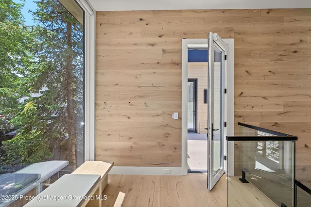 a bedroom with a bed and a fireplace