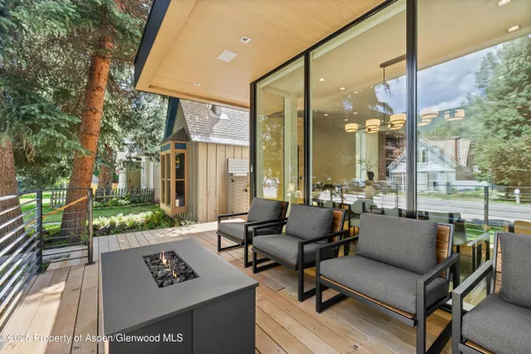 a view of a patio with couches and chairs