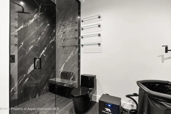 a view of a patio with table and chairs potted plants and large tree