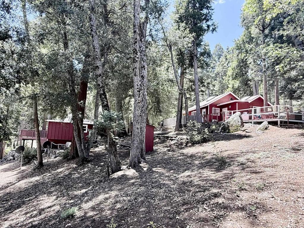 22292 Crestline Road Palomar Mountain, CA 92060 - Photo 36 of 38 an outdoor space with seating area and trees