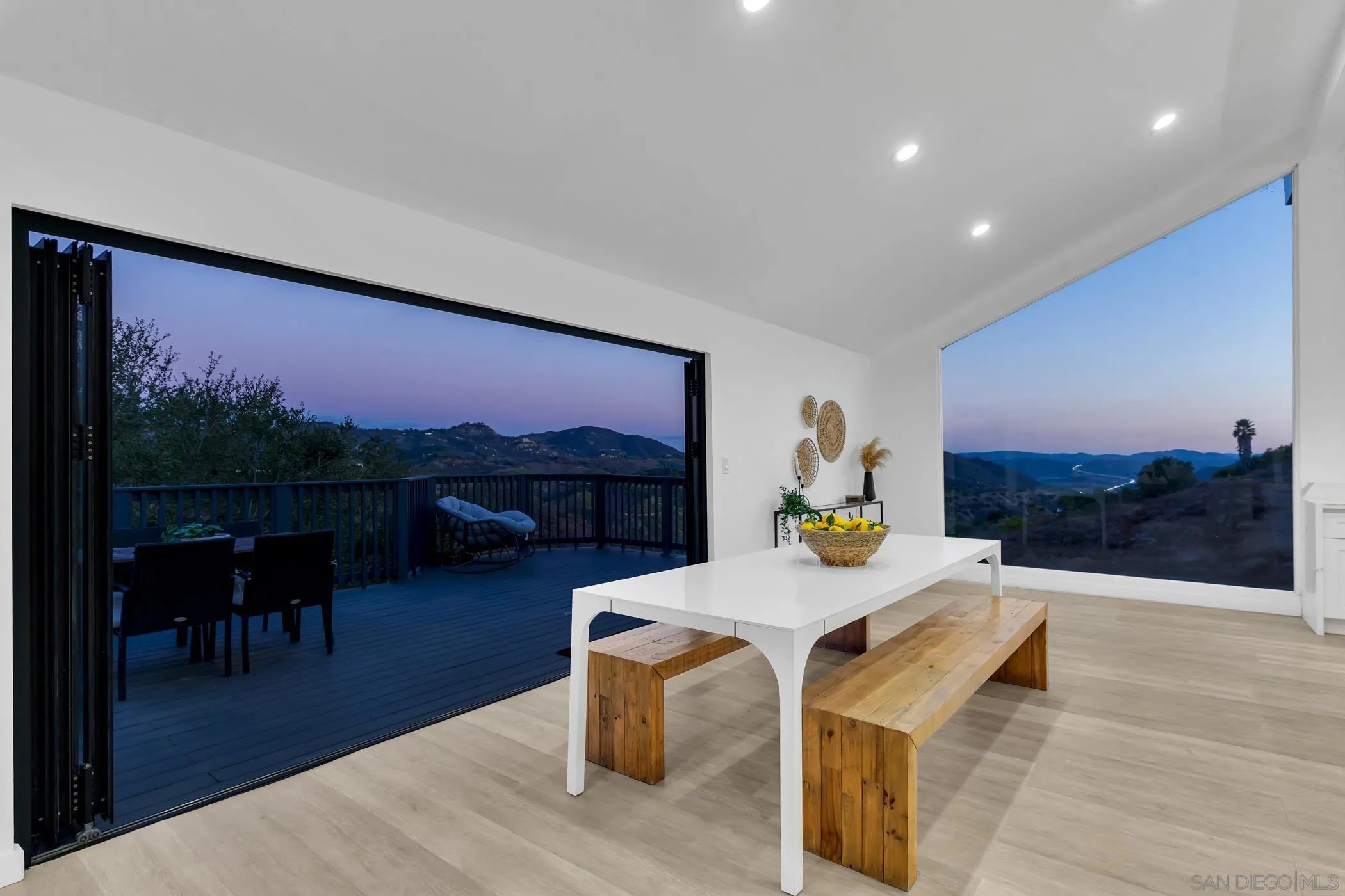 1029 Rainbow Valley Court Fallbrook, CA 92028 - Photo 11 of 75 a view of a dining room with furniture and wooden floor