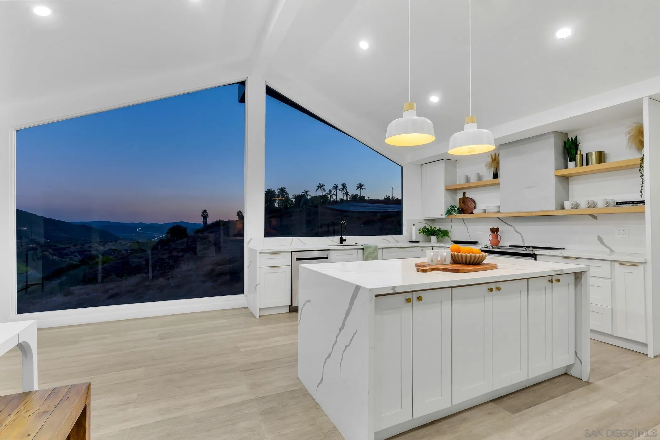 1029 Rainbow Valley Court Fallbrook, CA 92028 - Photo 14 of 75 a kitchen with a sink and cabinets