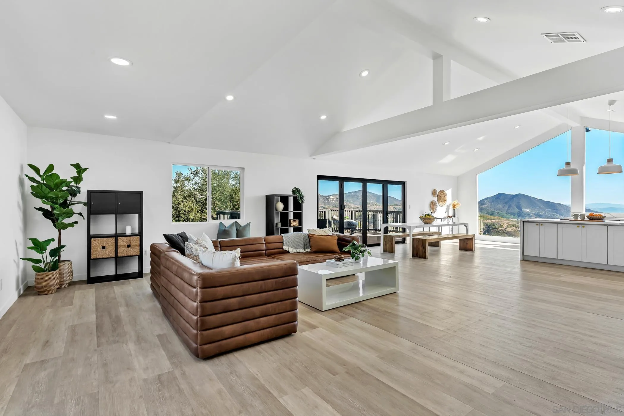 1029 Rainbow Valley Court Fallbrook, CA 92028 - Photo 19 of 75 a living room with furniture and a wooden floor