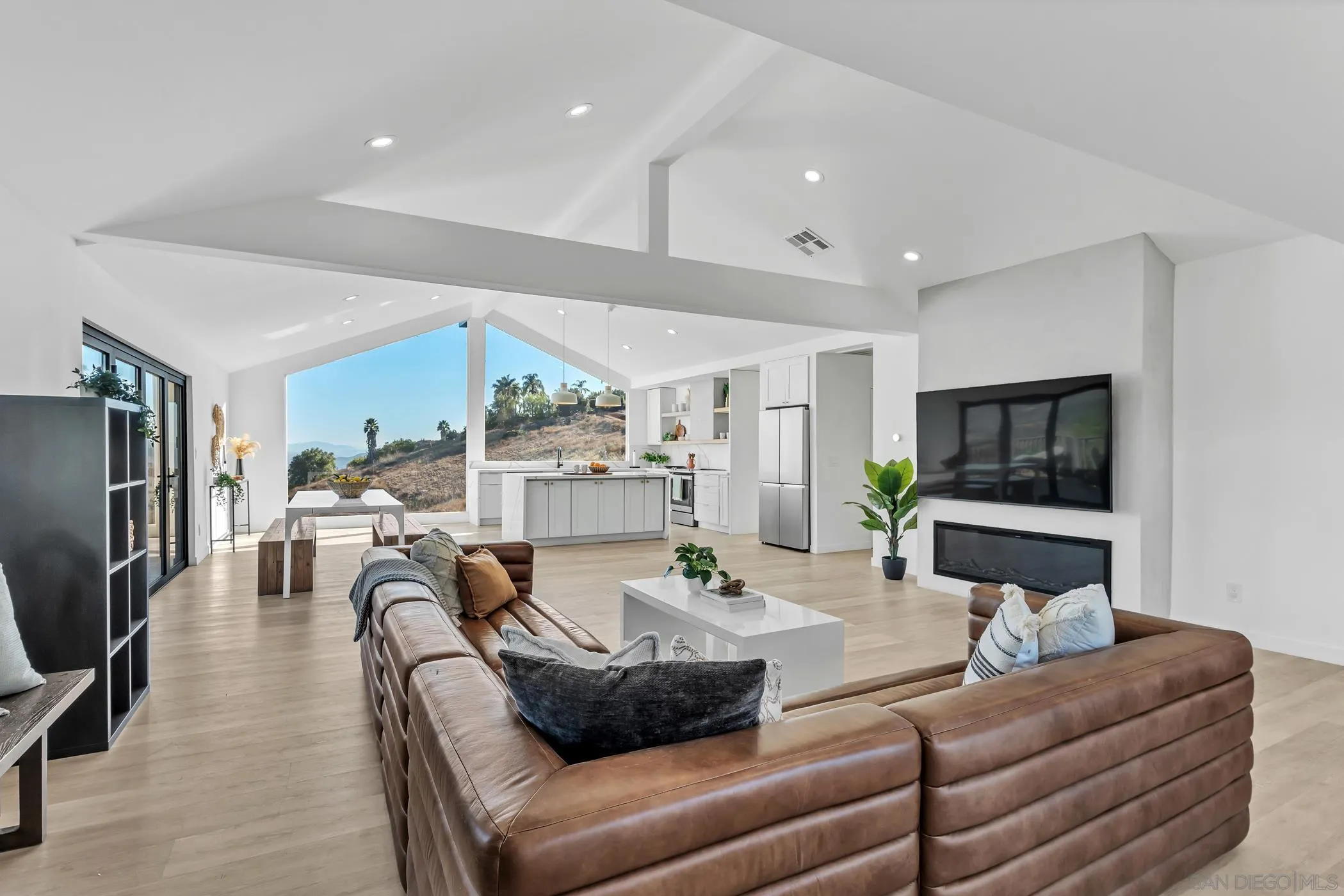 1029 Rainbow Valley Court Fallbrook, CA 92028 - Photo 22 of 75 a living room with furniture and a flat screen tv