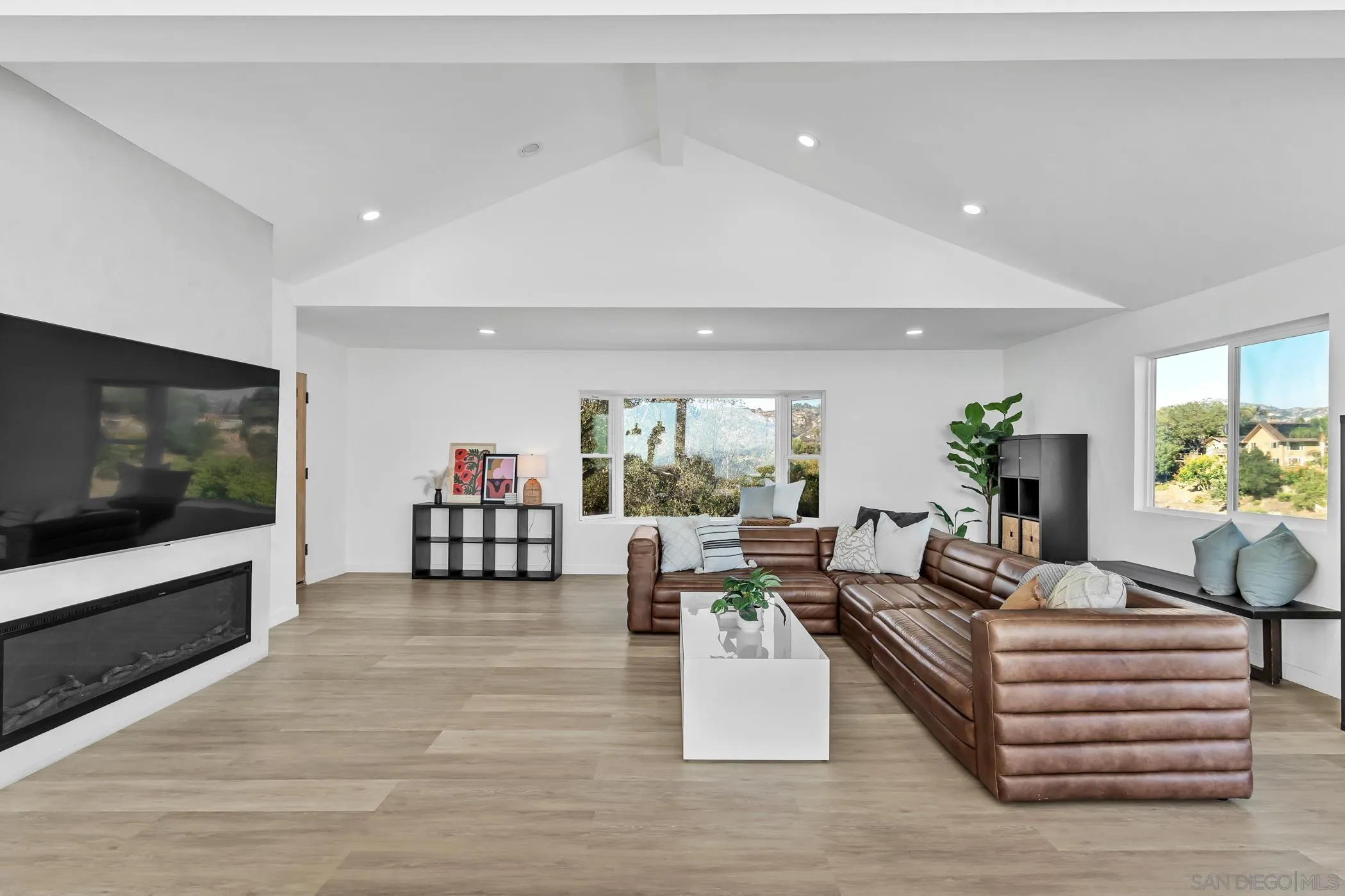 1029 Rainbow Valley Court Fallbrook, CA 92028 - Photo 23 of 75 a living room with furniture and a flat screen tv