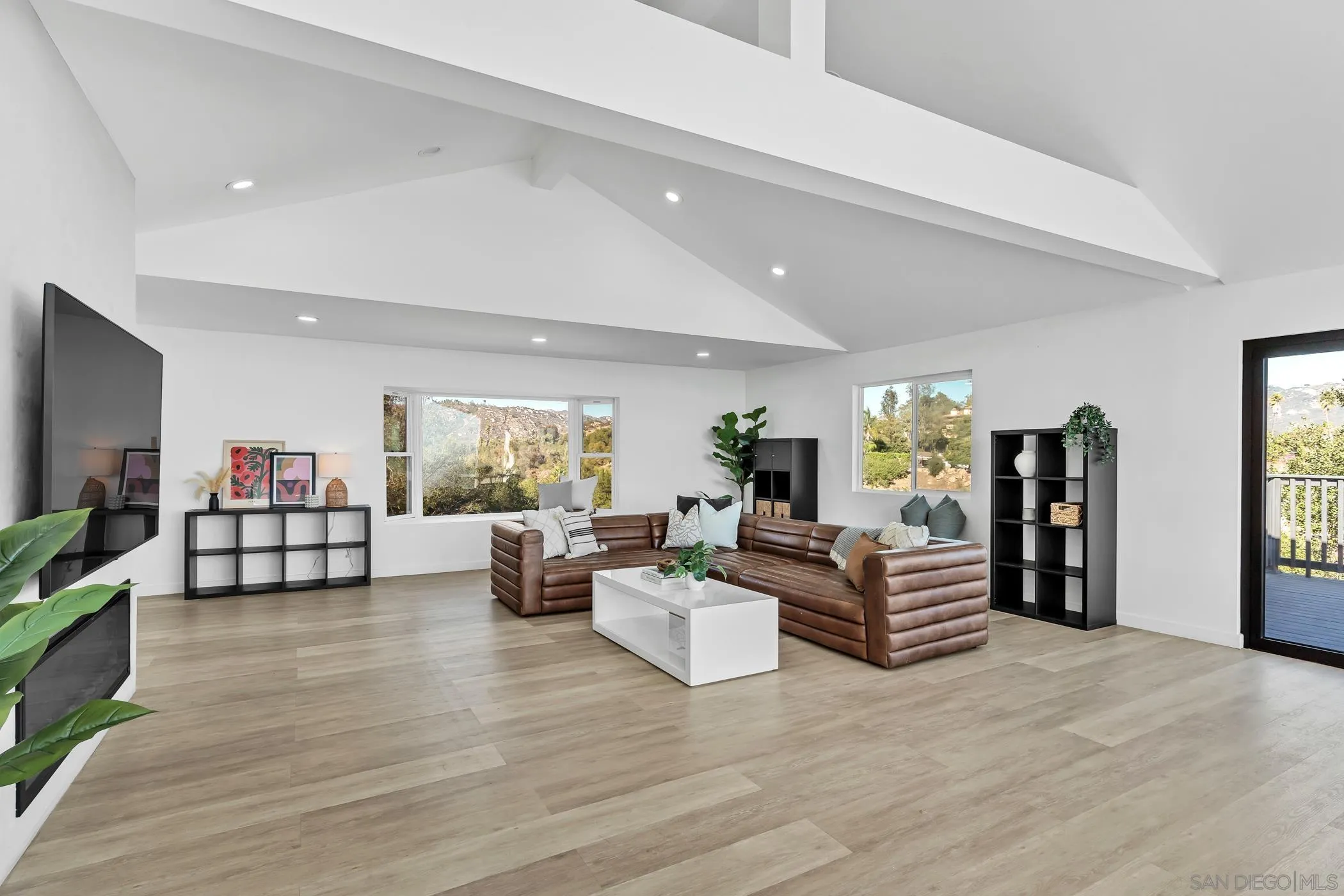 1029 Rainbow Valley Court Fallbrook, CA 92028 - Photo 24 of 75 a living room with furniture and a flat screen tv