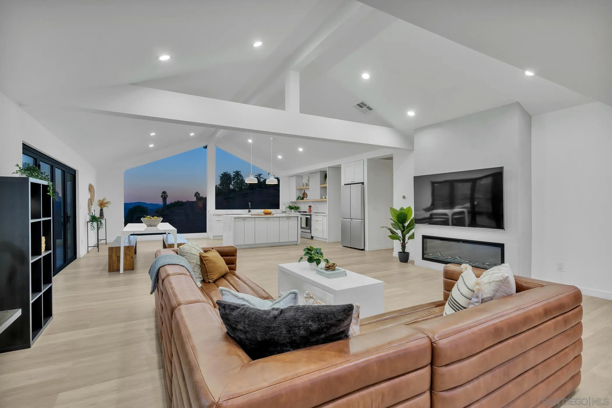 1029 Rainbow Valley Court Fallbrook, CA 92028 - Photo 6 of 75 a living room with furniture and a flat screen tv