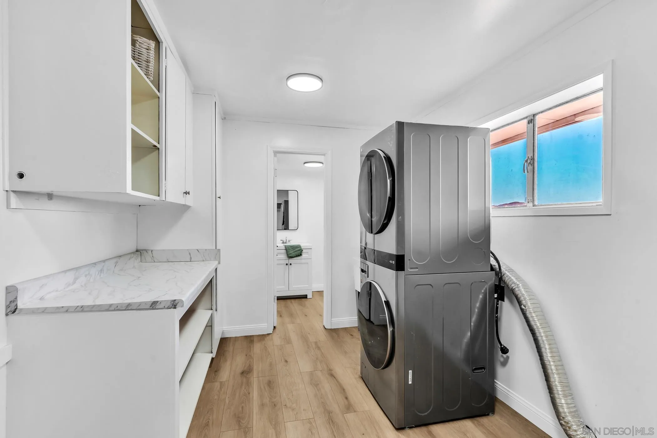 1029 Rainbow Valley Court Fallbrook, CA 92028 - Photo 65 of 75 a view of a kitchen with washer and dryer