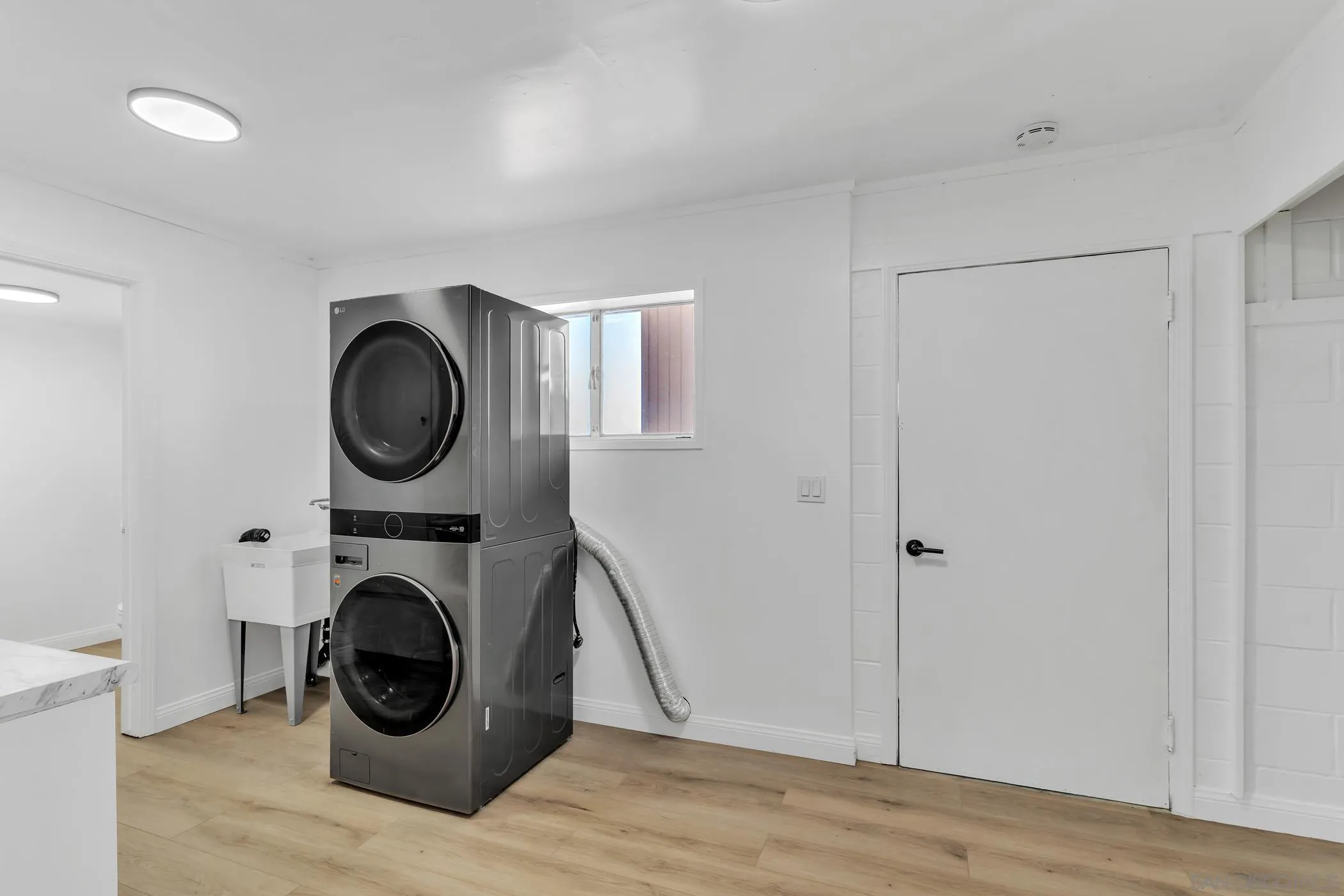 1029 Rainbow Valley Court Fallbrook, CA 92028 - Photo 67 of 75 a view of a livingroom with washer and dryer