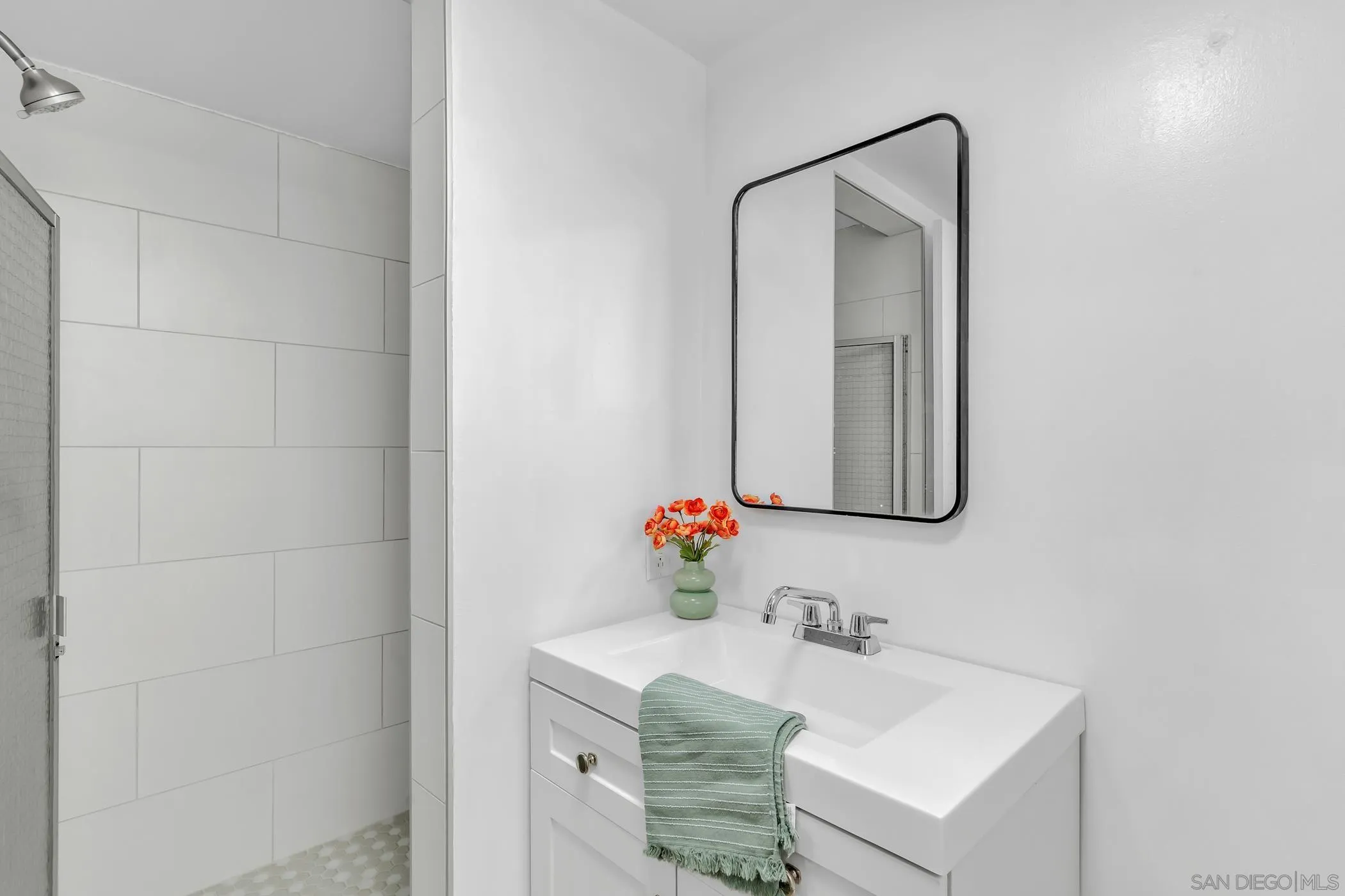 1029 Rainbow Valley Court Fallbrook, CA 92028 - Photo 68 of 75 a bathroom with a sink and a mirror