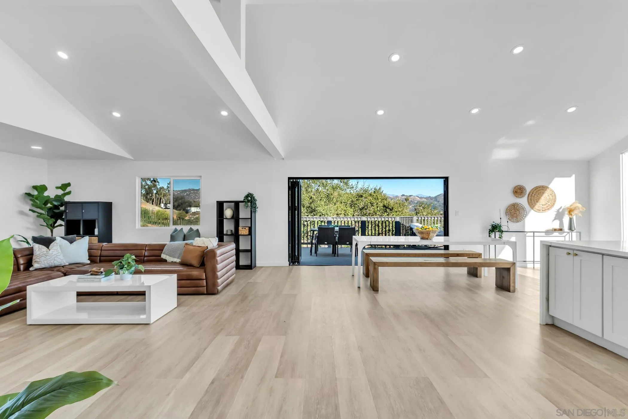 1029 Rainbow Valley Court Fallbrook, CA 92028 - Photo 70 of 75 a living room with furniture and a wooden floor