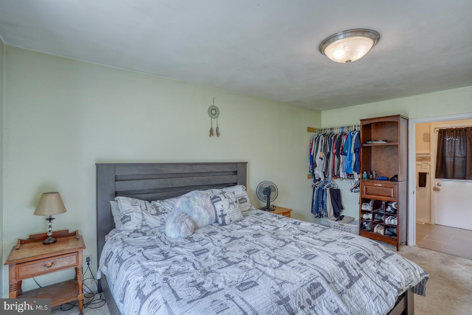 1245 Harrison Drive Dover, DE 19901 - Photo 26 of 47 a bedroom with a bed and a tv